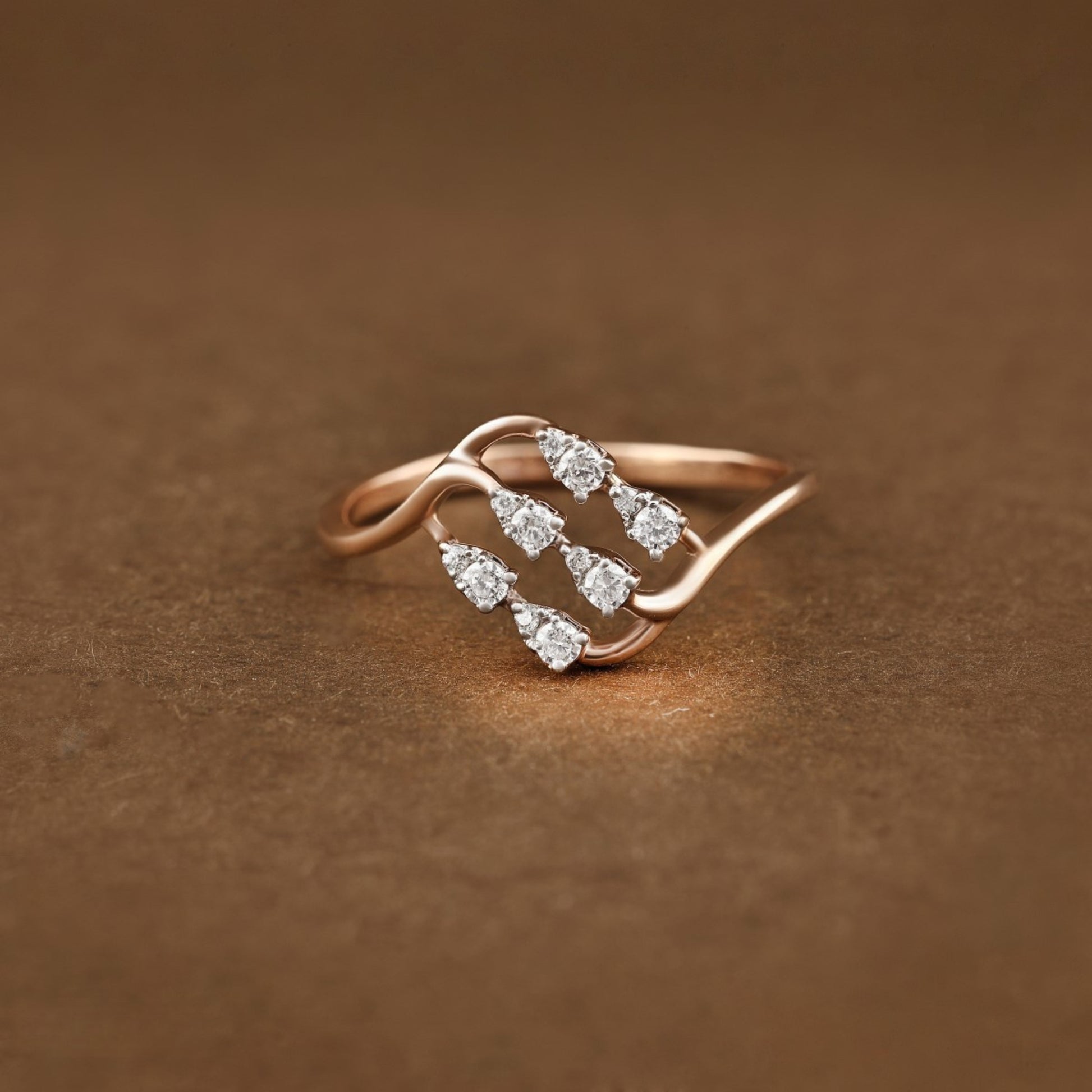 Diamond RING With 1.498 Gms of 18 Kt Gold and 0.132 Cts of Certified Natural Diamonds Code: MJ26RG658